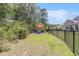 Spacious backyard featuring a fire pit area and ample green space, perfect for relaxation at 5581 Plantersville Pl., Myrtle Beach, SC 29579