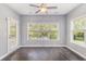 Bright dining area with ceiling fan and large windows overlooking fenced backyard and pool at 5581 Plantersville Pl., Myrtle Beach, SC 29579