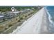 Aerial view of condos close to the beach showing parking and ocean views at 5601 N Ocean Blvd. # C-106, Myrtle Beach, SC 29577