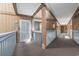 Well-maintained hallway with wooden accents, leading to individual unit entrances and fire safety equipment at 5601 N Ocean Blvd. # C-106, Myrtle Beach, SC 29577