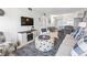Open-concept living area with modern decor, seamless flow to dining and kitchen spaces at 5601 N Ocean Blvd. # C-106, Myrtle Beach, SC 29577