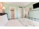 Inviting bedroom featuring access to the bathroom and kitchen at 5905 S Kings Highway # 6302, Myrtle Beach, SC 29575