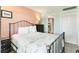 Cozy bedroom with a comfortable bed, dresser, and an ensuite bathroom at 5905 S Kings Highway # 6302, Myrtle Beach, SC 29575