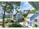 Exterior shot of the property showing community amenities, landscaping and building architecture at 5905 S Kings Highway # 6302, Myrtle Beach, SC 29575