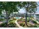 Scenic view of the community showcasing the pool, playground, and manicured grounds at 5905 S Kings Highway # 6302, Myrtle Beach, SC 29575