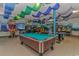 Recreational room features a pool table, arcade games, and playful nautical-themed ceiling decor at 6001-T36 South Kings Hwy., Myrtle Beach, SC 29575