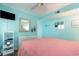 Comfortable bedroom with a mirror, offering ample space and calming decor at 609 Hillside Dr. S # C-10, North Myrtle Beach, SC 29582