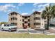 Attractive condo complex featuring multiple screened-in porches and convenient parking at 609 Hillside Dr. S # C-10, North Myrtle Beach, SC 29582