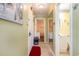 Inviting hallway leading to other rooms, featuring tiled flooring and ample lighting at 609 Hillside Dr. S # C-10, North Myrtle Beach, SC 29582