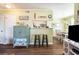 A view of the breakfast bar between the living room, kitchen, and dining area at 609 Hillside Dr. S # C-10, North Myrtle Beach, SC 29582