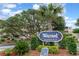 Inviting Wai Pani complex sign on Hillside Dr. with lush tropical landscaping at 609 Hillside Dr. S # C-10, North Myrtle Beach, SC 29582