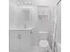 Bright white bathroom features a stylish vanity, toilet and shower with decorative curtain at 6253 Catalina Dr. # 1533, North Myrtle Beach, SC 29582