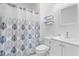 Cozy bathroom featuring a vanity with great lighting, a toilet, and shower with patterned curtain at 6253 Catalina Dr. # 1533, North Myrtle Beach, SC 29582