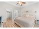 Serene bedroom with wood floors, en suite, and a comfortable king bed at 6253 Catalina Dr. # 1533, North Myrtle Beach, SC 29582