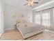 Bright bedroom featuring a neutral color scheme, tray ceiling, and soft, natural light at 6253 Catalina Dr. # 1533, North Myrtle Beach, SC 29582