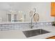 Kitchen sink with white countertops and subway tile backsplash at 6253 Catalina Dr. # 1533, North Myrtle Beach, SC 29582