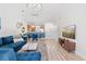 Bright living room with an open floor plan that shows the dining area and contemporary decorations at 6253 Catalina Dr. # 1533, North Myrtle Beach, SC 29582