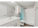 Clean bathroom with white vanity, updated fixtures, and a shower-tub combination at 6485 Royal Pine Dr., Myrtle Beach, SC 29588