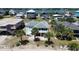 Beautiful aerial view of a beach house nestled among palm trees, with easy access to the ocean at 668 S Waccamaw Dr., Murrells Inlet, SC 29576