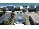 Stunning aerial view of a coastal home, showcasing its proximity to the beach and surrounding neighborhood at 668 S Waccamaw Dr., Murrells Inlet, SC 29576