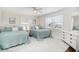 Inviting bedroom features two queen beds, white wood paneling, and light blue decor at 668 S Waccamaw Dr., Murrells Inlet, SC 29576