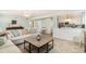 Comfortable living room offering a large sofa and an open view into the kitchen at 668 S Waccamaw Dr., Murrells Inlet, SC 29576