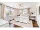 Serene bedroom featuring wood floors, neutral tones, and ample natural light at 668 S Waccamaw Dr., Murrells Inlet, SC 29576