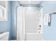Cozy bathroom featuring a tub/shower combo with white shower curtain at 700 Lorenzo Dr., North Myrtle Beach, SC 29582