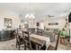 Open floor plan showcasing the dining room and a view into the kitchen and living room at 700 Lorenzo Dr., North Myrtle Beach, SC 29582