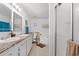 Bathroom featuring a double sink vanity, standing shower, and separate soaking tub at 7012 Walden Ct., Myrtle Beach, SC 29588
