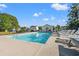 A refreshing community pool with lounge chairs, perfect for relaxation and enjoying sunny days at 7012 Walden Ct., Myrtle Beach, SC 29588