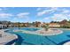 The expansive community pool sparkles under a sunny sky, offering a refreshing oasis for residents to enjoy at 7088 Shooting Star Way, Myrtle Beach, SC 29579