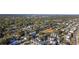 Aerial view of neighborhood showcasing lush greenery, mature trees, and residential homes at 712 Dogwood Dr. S # 101, Surfside Beach, SC 29575