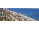 Coastal aerial view of the neighborhood with beachfront condos, pier and Atlantic Ocean at 712 Dogwood Dr. S # 101, Surfside Beach, SC 29575