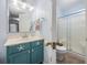 Decoratively themed bathroom features a shower and cute vanity with nautical hardware at 712 Dogwood Dr. S # 101, Surfside Beach, SC 29575