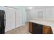 The kitchen is equipped with white appliances, lots of counterspace, and lots of pantry storage at 712 Dogwood Dr. S # 101, Surfside Beach, SC 29575