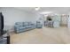 Well-lit living room with open floor plan and comfortable seating at 712 Dogwood Dr. S # 101, Surfside Beach, SC 29575