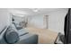 Open-concept living room features a couch and dining area at 712 Dogwood Dr. S # 101, Surfside Beach, SC 29575