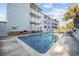 Exterior view of the sparkling swimming pool area with lounge chairs at condo complex at 712 Dogwood Dr. S # 101, Surfside Beach, SC 29575