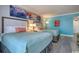 Comfortable bedroom featuring two beds, stylish decor, and a relaxing atmosphere at 7200 N Ocean Blvd. # 436, Myrtle Beach, SC 29572