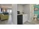 Convenient kitchenette with a mini-fridge, sink, and modern appliances at 7200 N Ocean Blvd. # 436, Myrtle Beach, SC 29572