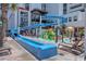 Outdoor waterpark with lazy river, tall slide, and play area at resort at 7200 N Ocean Blvd. # 436, Myrtle Beach, SC 29572