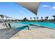Stunning community pool with lounge chairs and shade providing a resort-like experience for residents at 1421 Crested Iris Way, North Myrtle Beach, SC 29582
