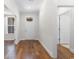Bright foyer with hardwood floors and white trim throughout at 1421 Crested Iris Way, North Myrtle Beach, SC 29582