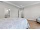 Serene main bedroom featuring hardwood floors and an ensuite bathroom at 1421 Crested Iris Way, North Myrtle Beach, SC 29582