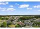 Neighborhood aerial view featuring various homes and a small pond at 761 Drawbridge Dr., Conway, SC 29526
