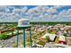 Aerial view showcasing a cityscape with a prominent water tower at 761 Drawbridge Dr., Conway, SC 29526