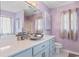 Elegant bathroom featuring a unique silver bowl sink, quartz countertop and modern fixtures at 761 Drawbridge Dr., Conway, SC 29526