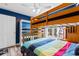 Cozy bedroom with wooden bunk beds, bright colors, and a window view at 761 Drawbridge Dr., Conway, SC 29526