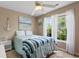 Cozy bedroom features natural light, beachy décor, and ceiling fan at 761 Drawbridge Dr., Conway, SC 29526